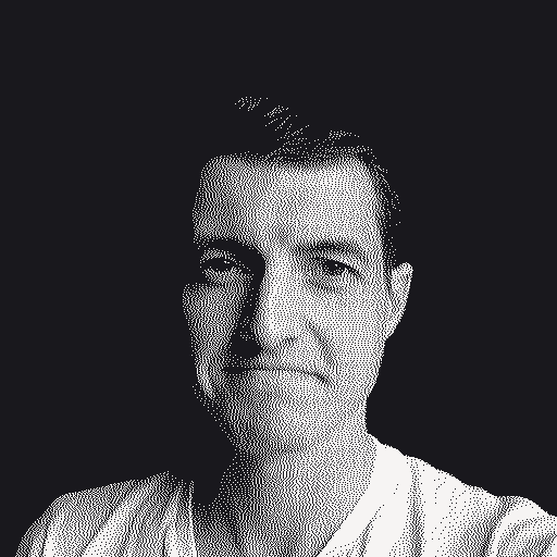 A black and white, dithered photograph of Chris van Wagoner